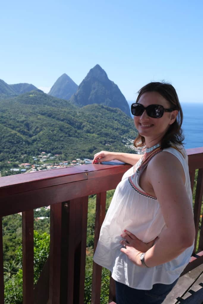Claire standing in front of The Pitons in St Lucia during an island tour