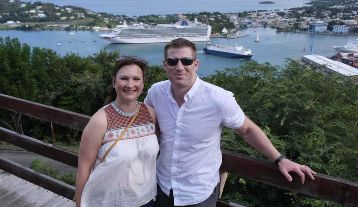 Claire and Mr Tin Box stood in front of harbour view in St Lucia