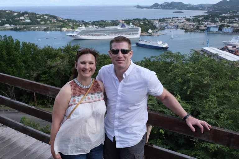 Claire and Mr Tin Box stood in front of harbour view in St Lucia