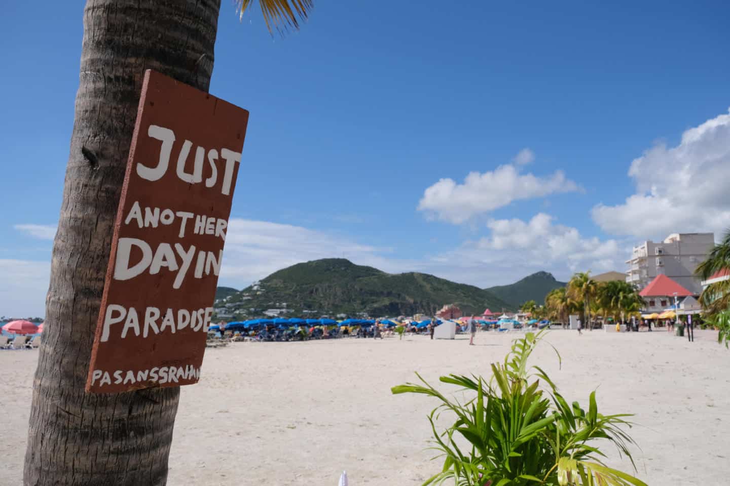Just another day in paradise sign on Grand Beach in St Maarten