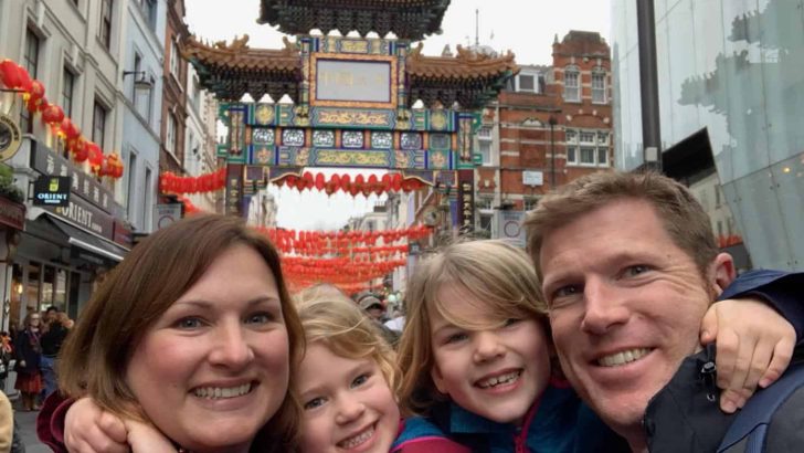 Tin Box family stood in front of Chinatown in London