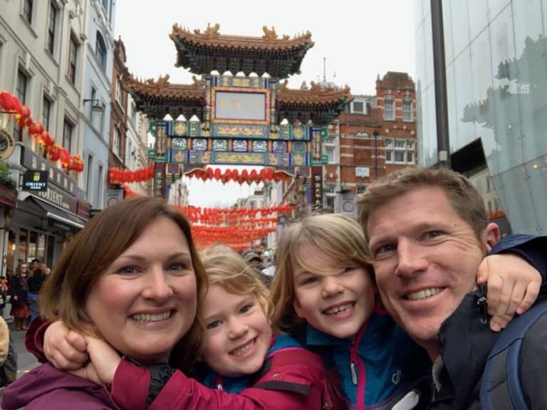 Tin Box family stood in front of Chinatown in London