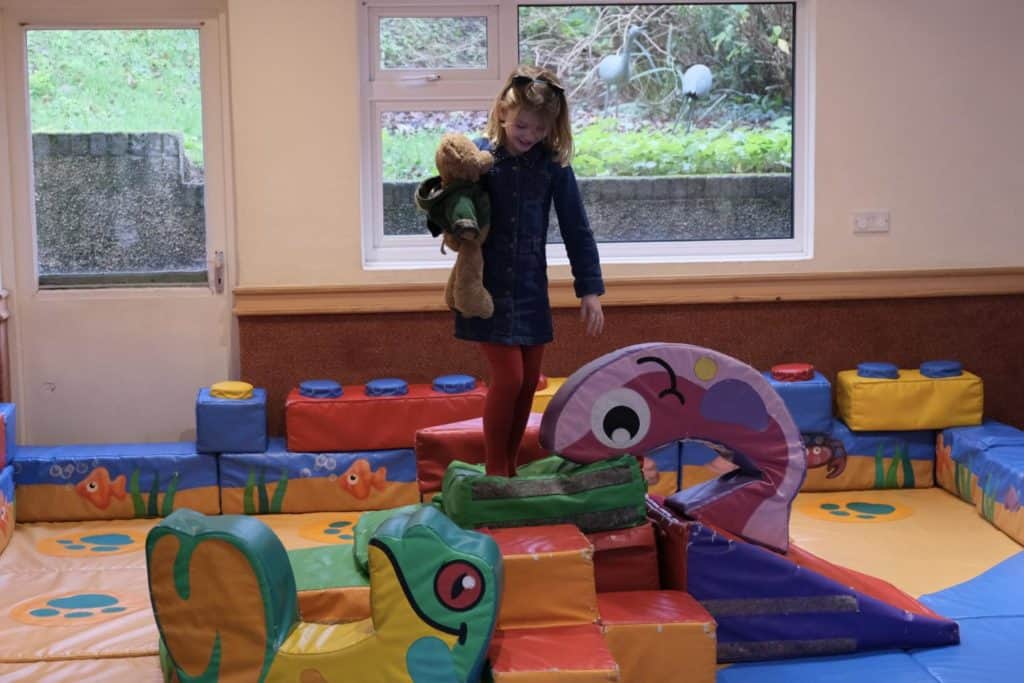 Tot in playroom