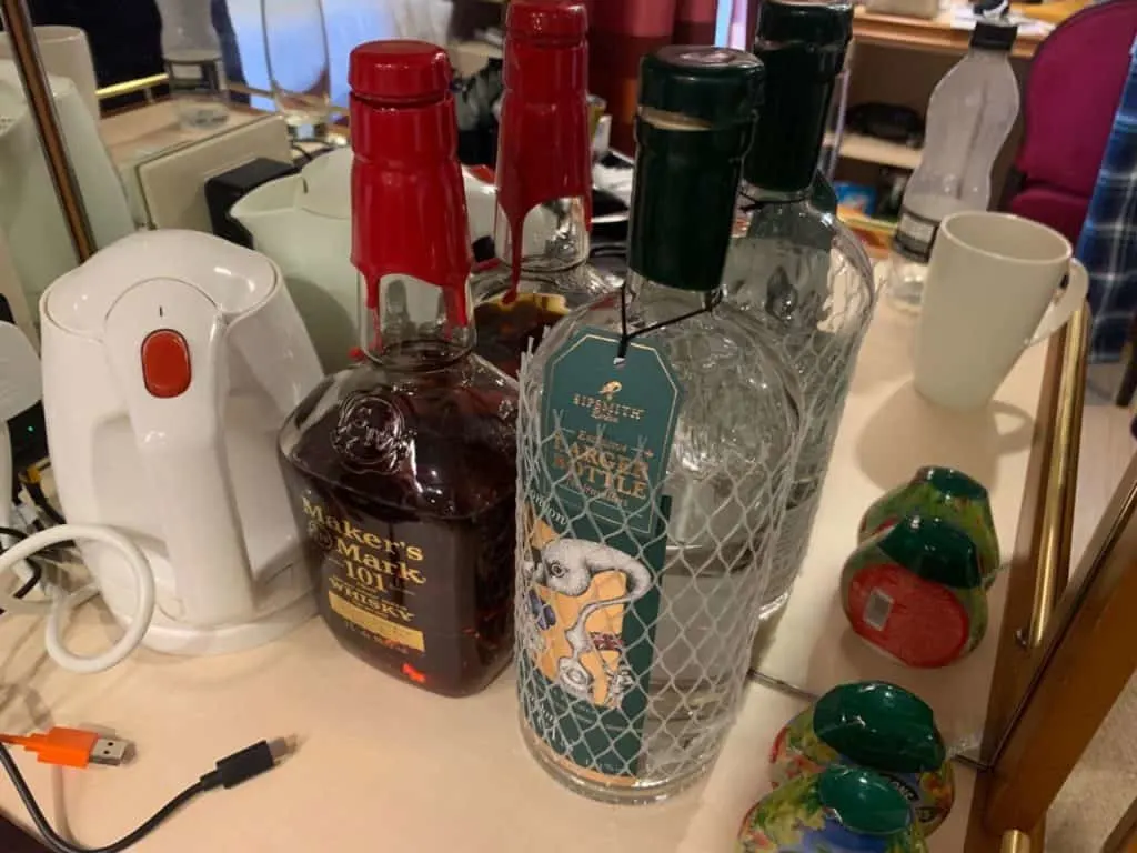 Two litre bottle bottles of spirits in cruise ship cabin