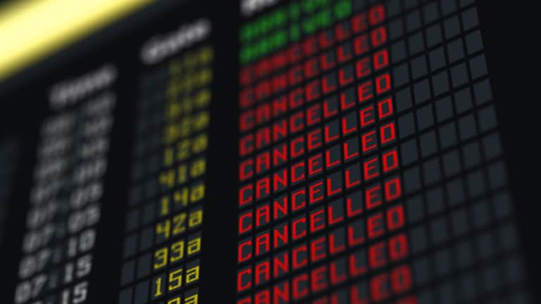 Cancelled flights shown on airport departure board