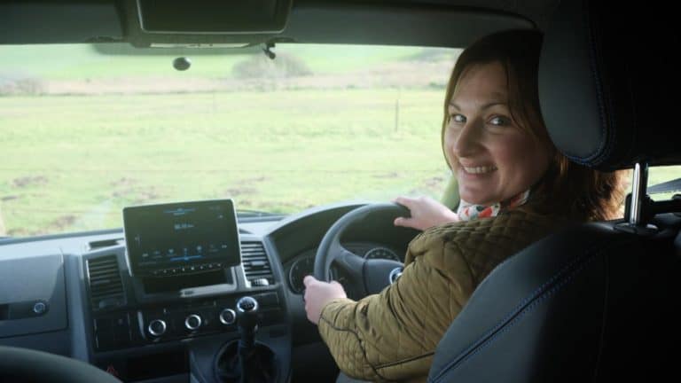 Claire in drivers seat of stationary van