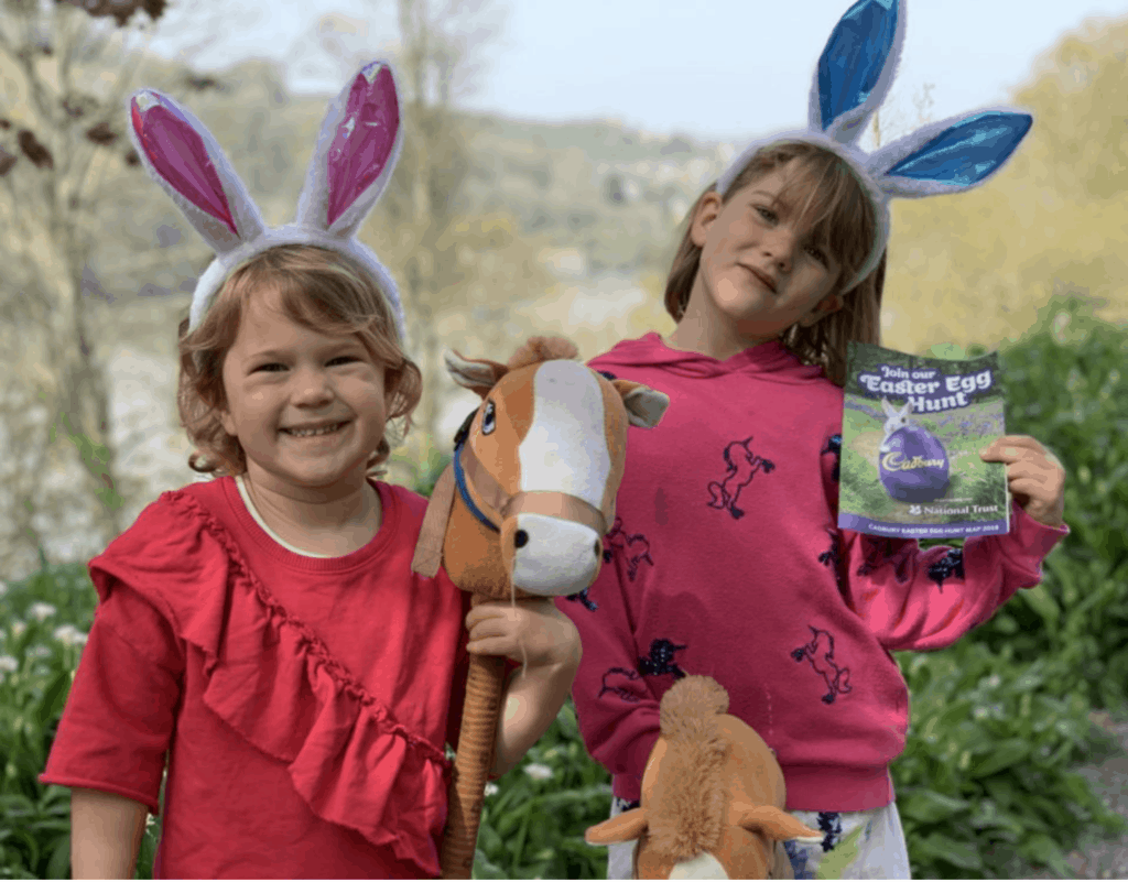 Children wearing rabbit ears on a Easter trail