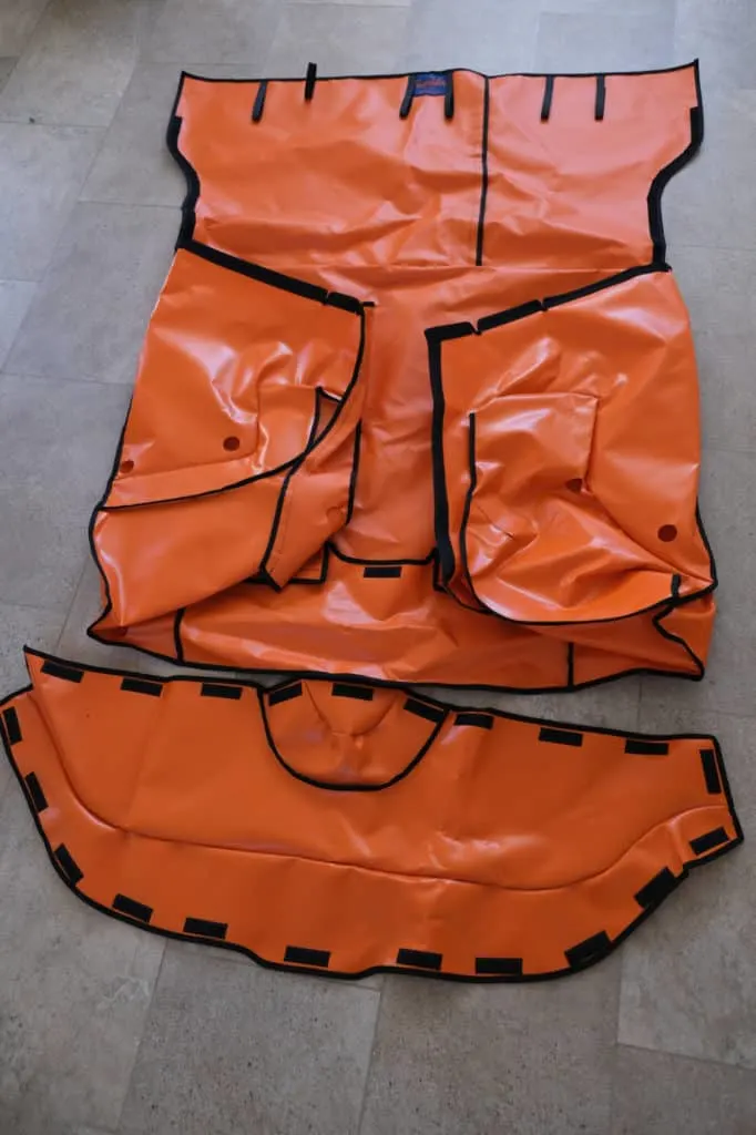 Hatchbag bootliner parts laid out on floor