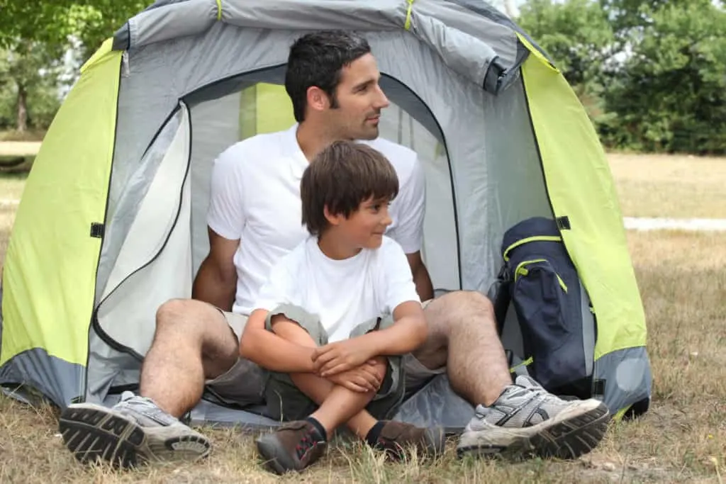 Single dad camping with his son