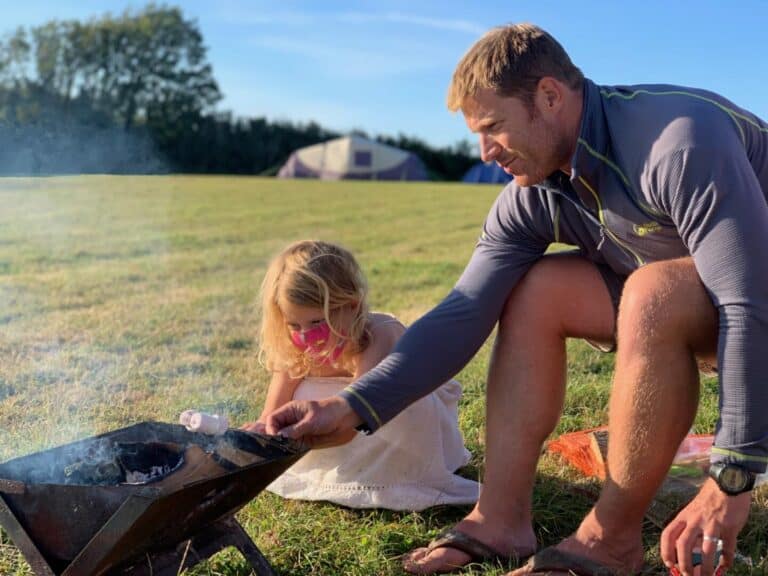 Toasting marshmallows over a fire pit