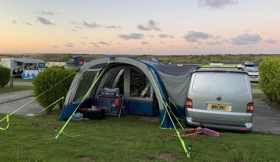 OLPRO Cocoon Breeze inflatable awning on camper van at campsite