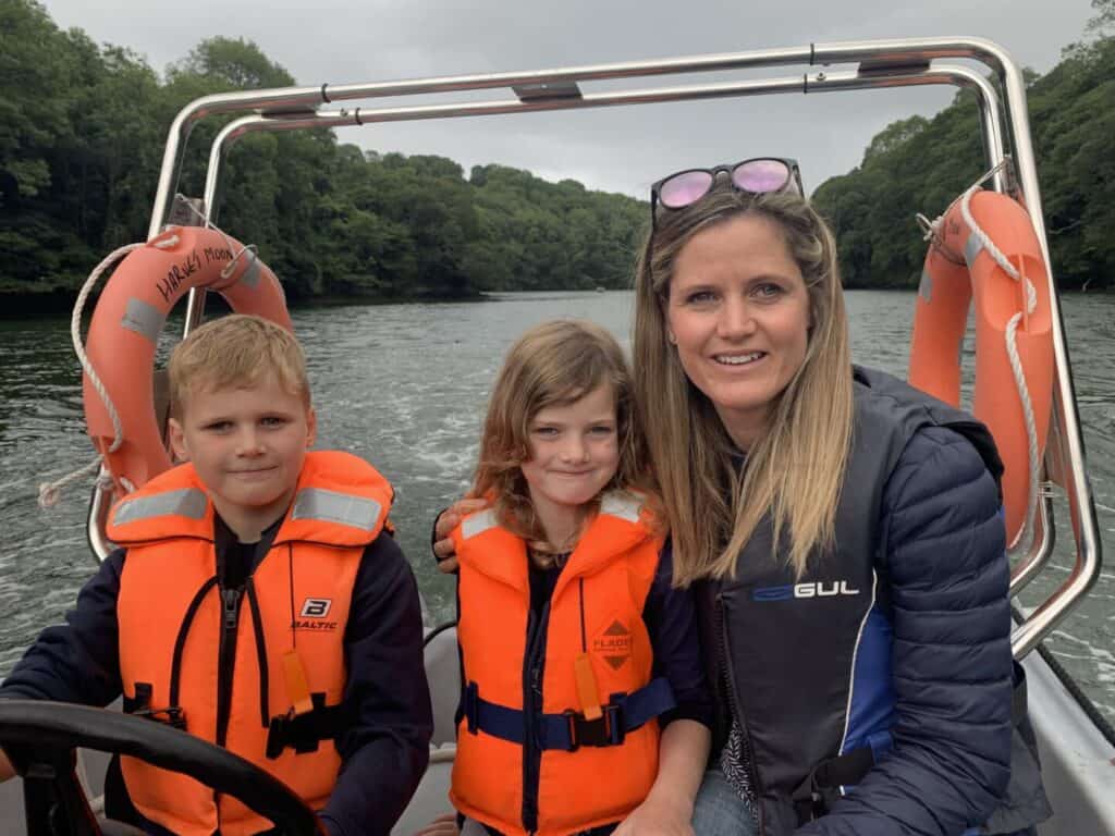 Katie and kids on a boat trip
