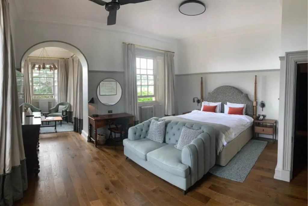 Family bedroom with double bed, sofa and sitting room
