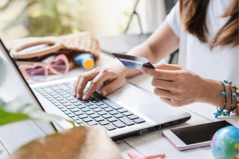 Woman booking a holiday online