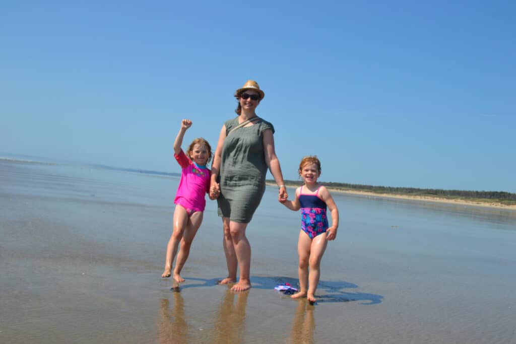 Claire and girls on beach in Wales