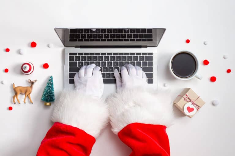 Santa shopping on laptop