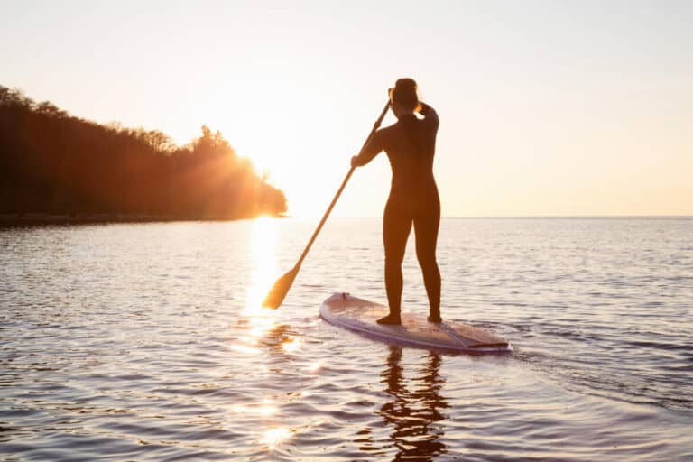Paddle boarding in winter sun
