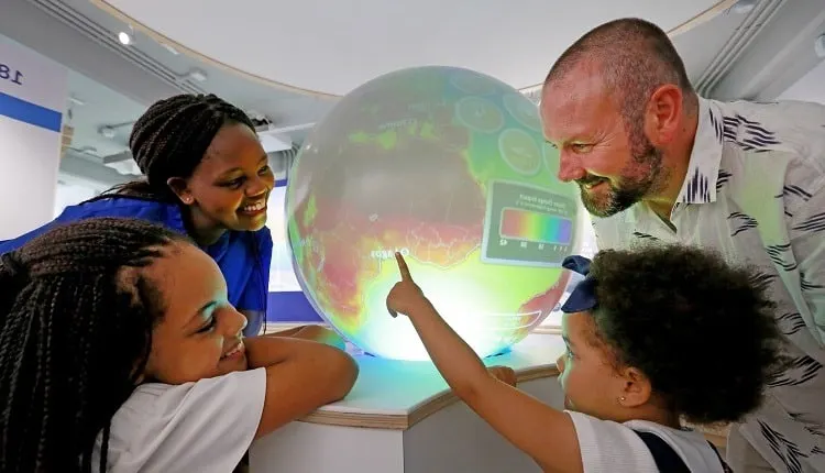 Family around globe at Rampion Centre
