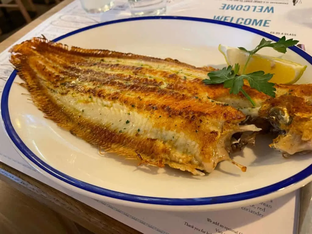 A whole Dover Sole on plate at Rockfish in Poole