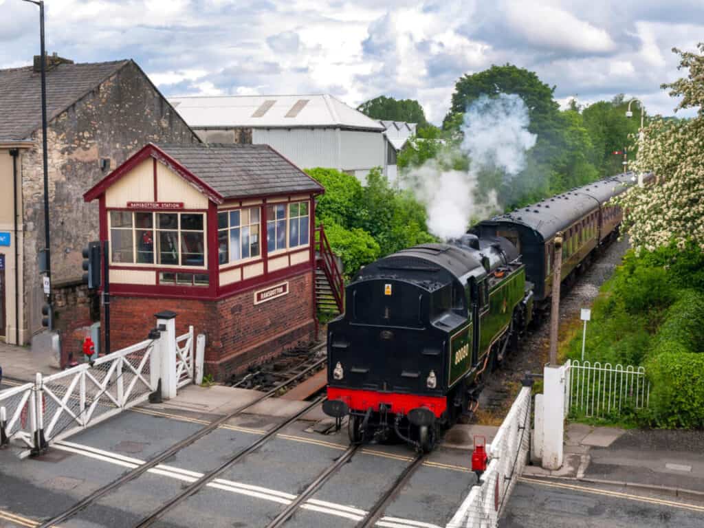 Train at signal point crossing on East Lancashire Railway