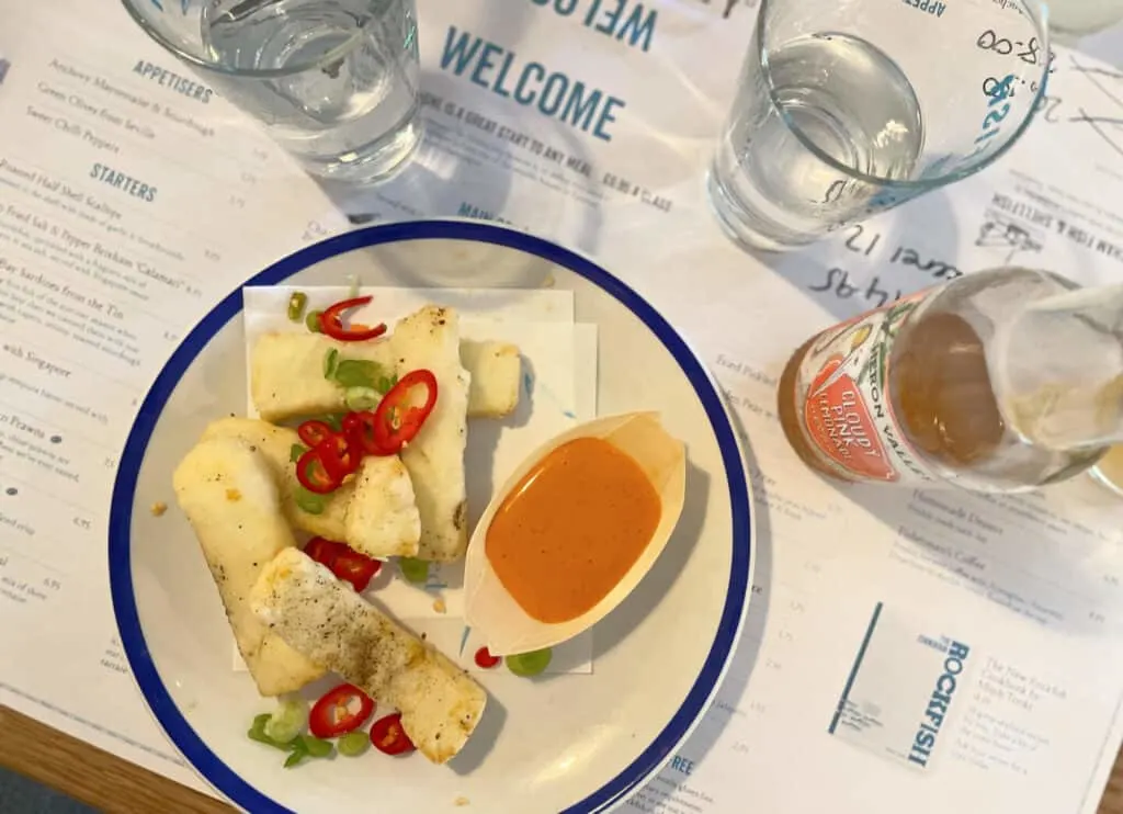 Crispy Halloumi covered in chilli slices with dipping sauce