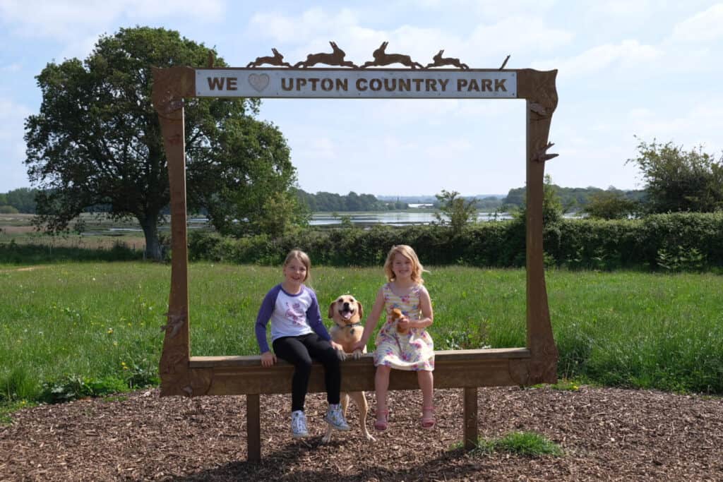Kids and dog in picture frame at Upton Country Park in Poole