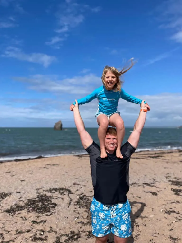 Tot stood on Mr Tin Box's shoulders at South Milton Sands beach