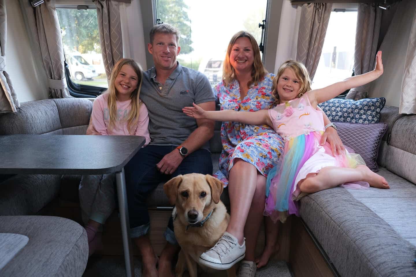 Tin Box Traveller family sat inside the Pegasus Grande SE Rimini caravan