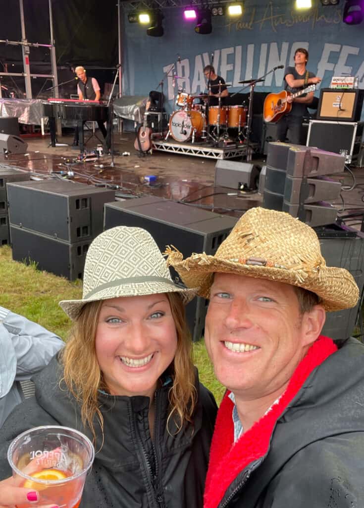 Claire and Mr Tin Box taking selfie in front of Travelling Feast stage