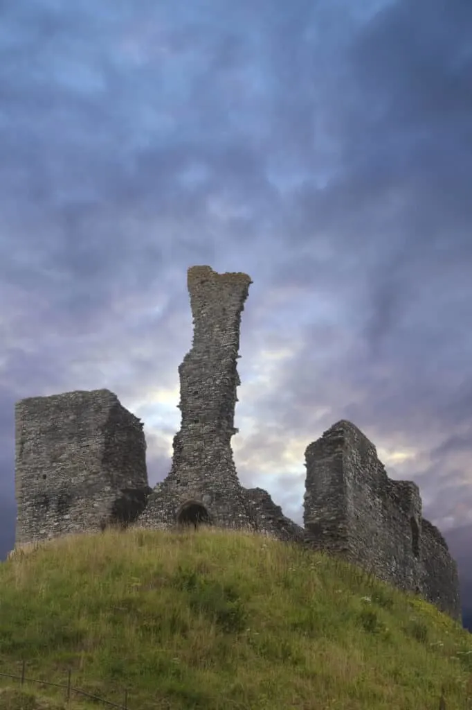 Ruins of Okehampton Castle against grey sky