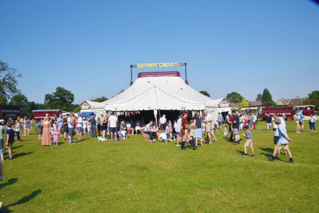 Giffords Circus white tent in field