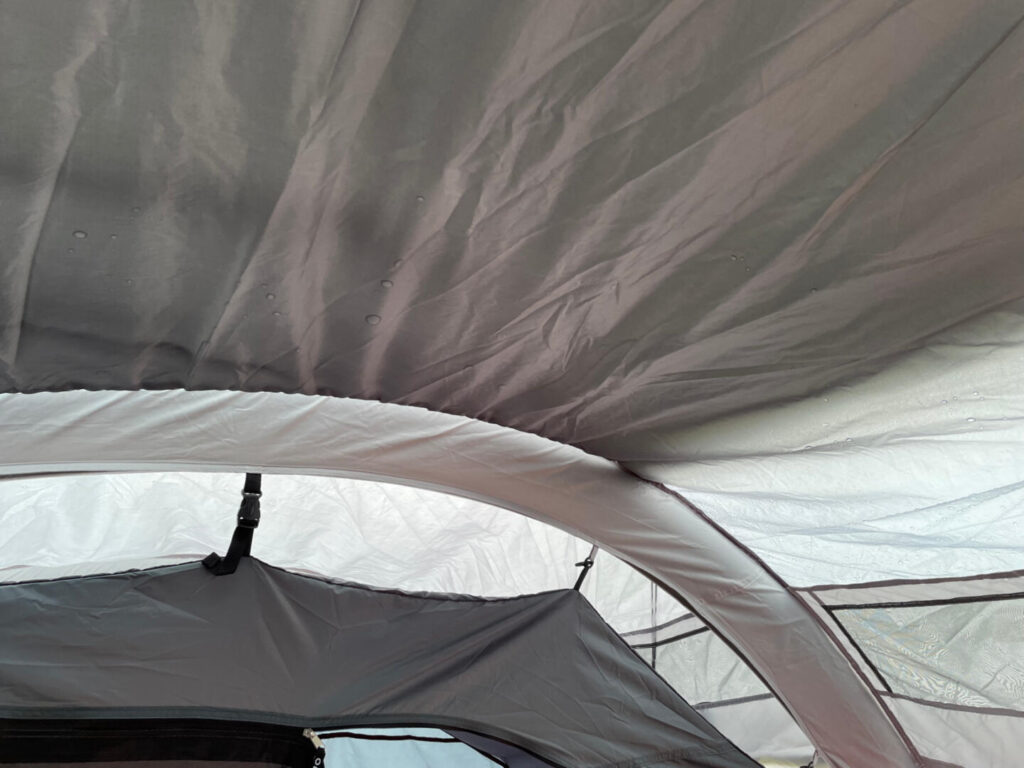 Rain caught under tent canvas