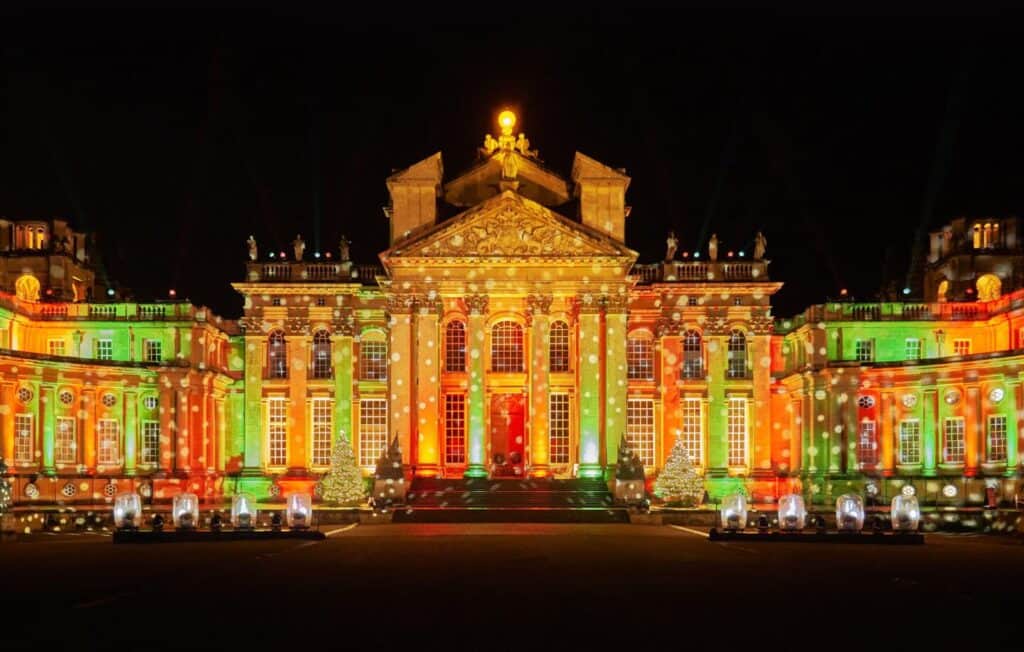 Colourful lights projected onto the front of Blenheim Palace