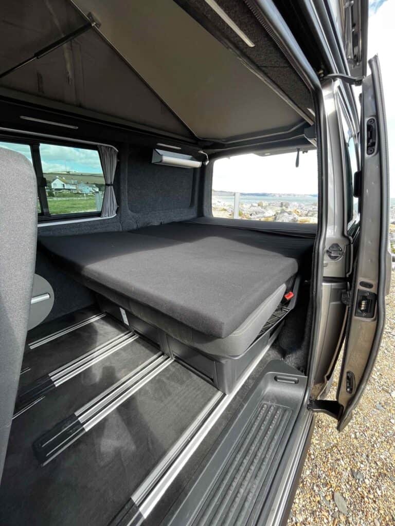 Rock and roll camper van bed