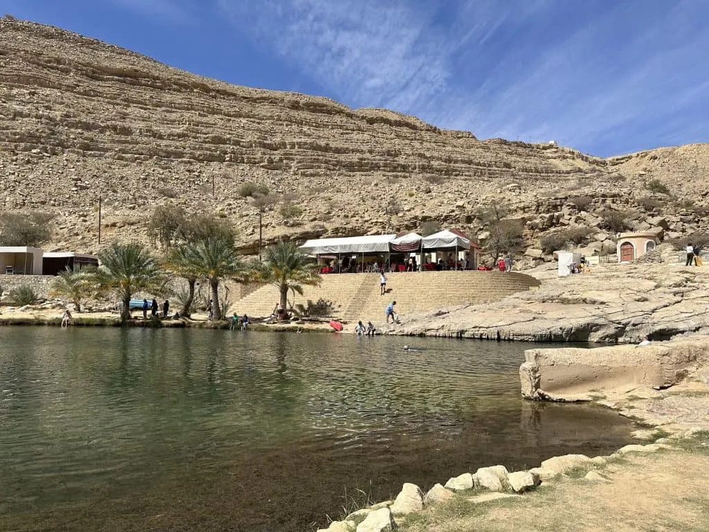 A view of the restaurant at Wadi Bani Khalid over the waters of the first pool.