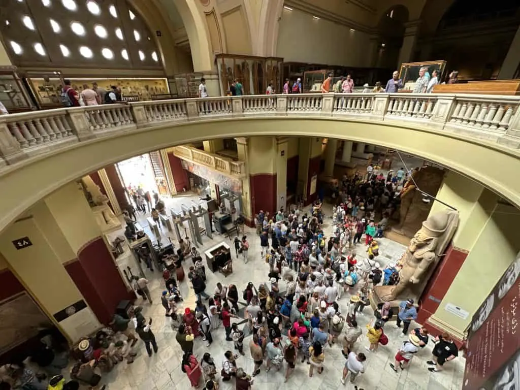 Hundreds of people milling around in the entrance lobby of the Egyptian Museum in Cairo