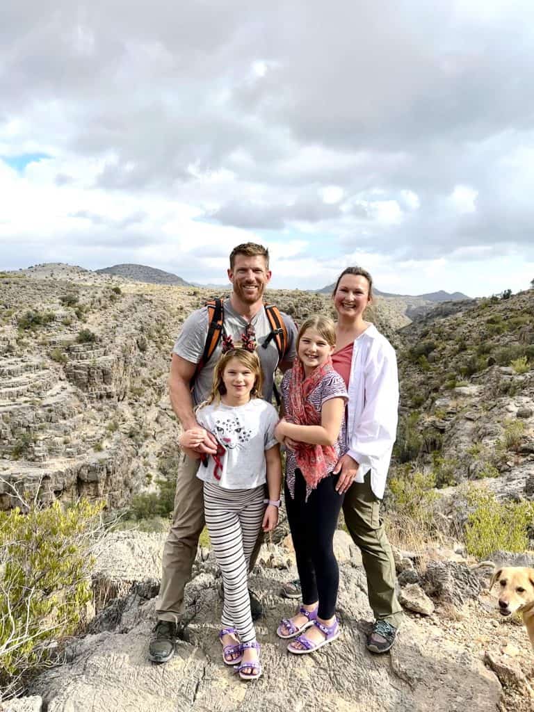 Tin Box family posing for a picture during a hike on Jabal Akhdar mountain in Oman's Hajar Mountains