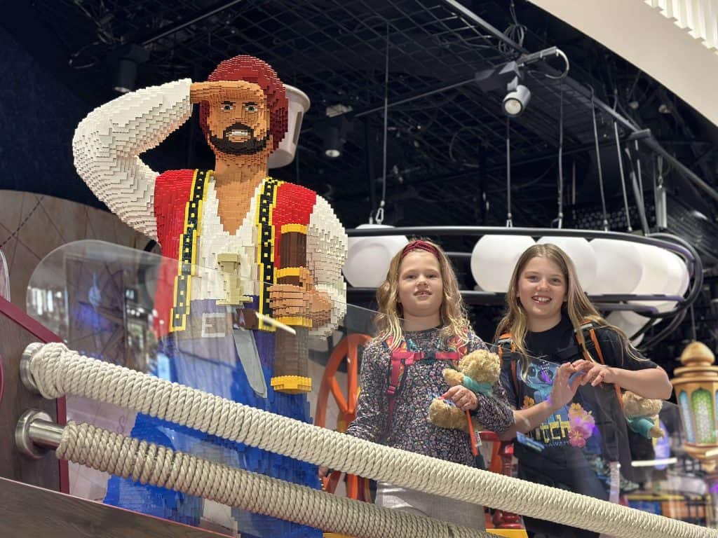 Our daughters stood next to a life-sized Lego Sinbad the Sailor at Muscat airport