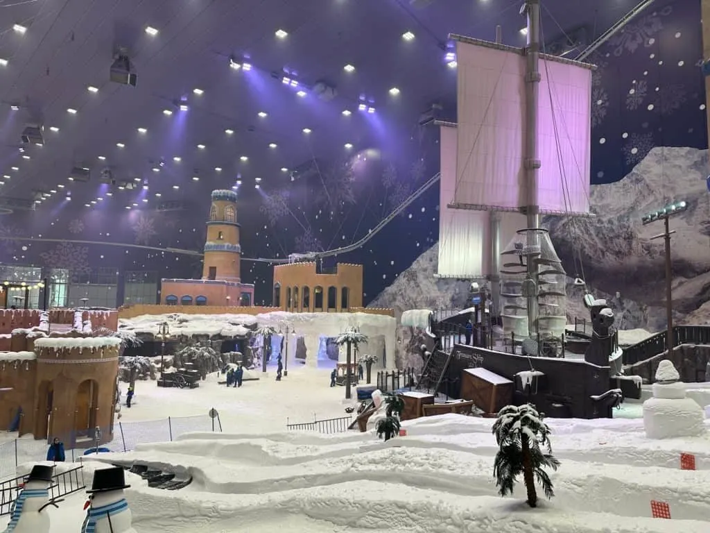 View of slides, the Treasure Shop and Omani-style buildings in the huge snow park