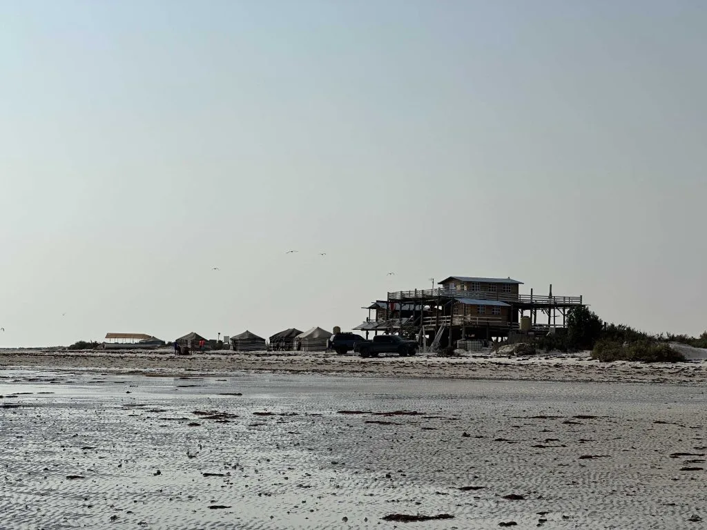 A two storey beach villa on stilts at Barr al Hickman. This is Whale Camp the only permanent accommodation on this lagoon in Oman