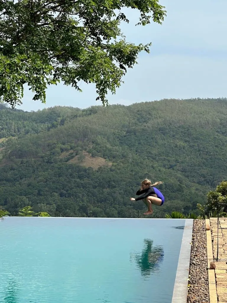 Our ten year old bombs into the infinity pool at Koslanda