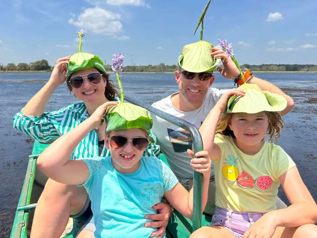 The Tin Box family say in double kayak weather water lily hats