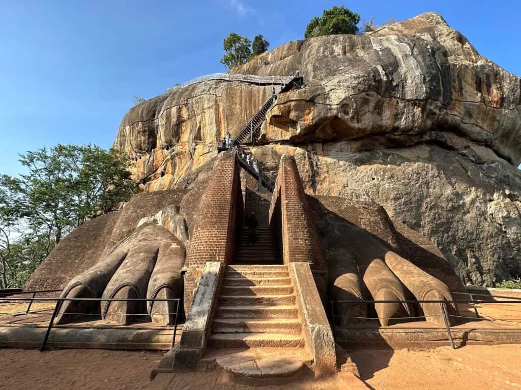 Giant Lion's paws either side of brick steps at the entrance of the Sigiriya rock palace complex