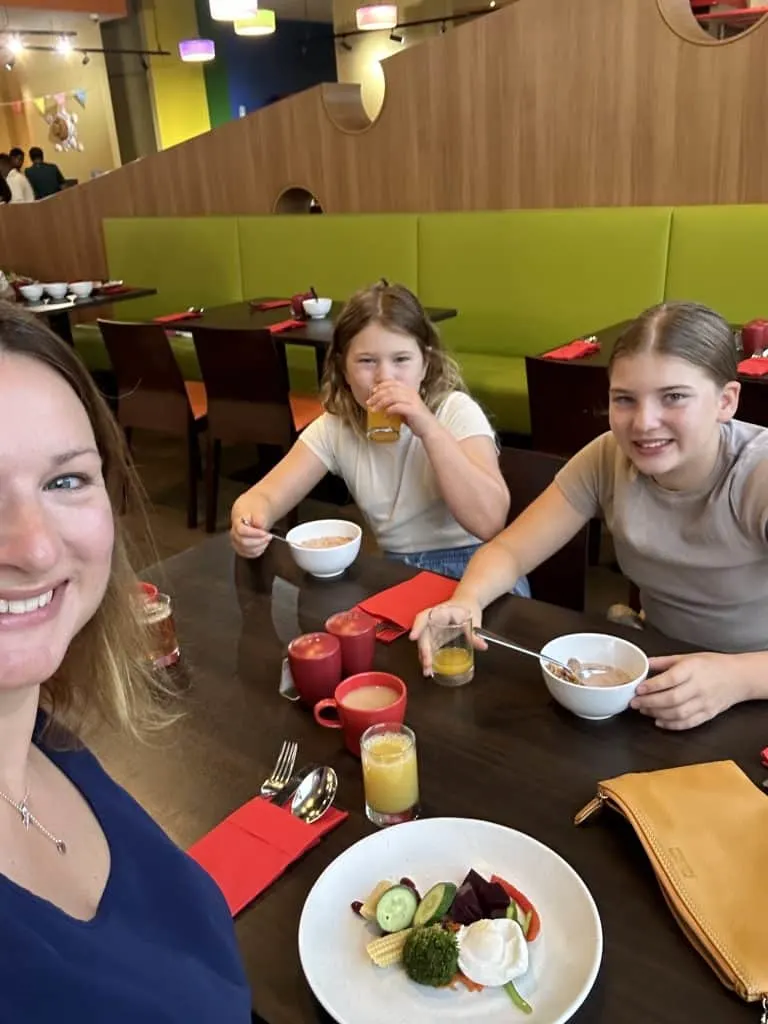 Claire and her daughters eating breakfast in the Bricks Family Restaurant