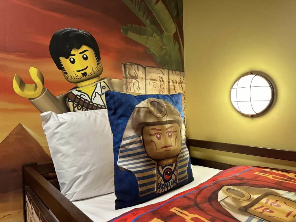 Adventure themed bedding on the top bunk of out LEGOLAND hotel room