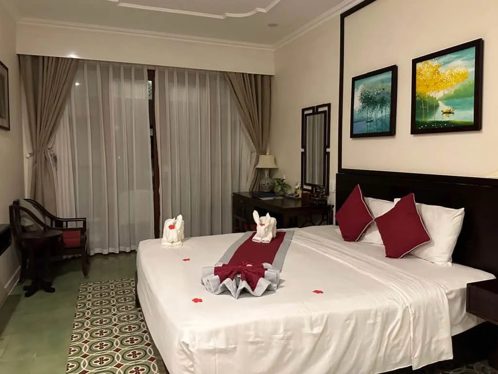 A King-sized double bed in our Riverside room at Lantana Riverside Hotel in Hoi An