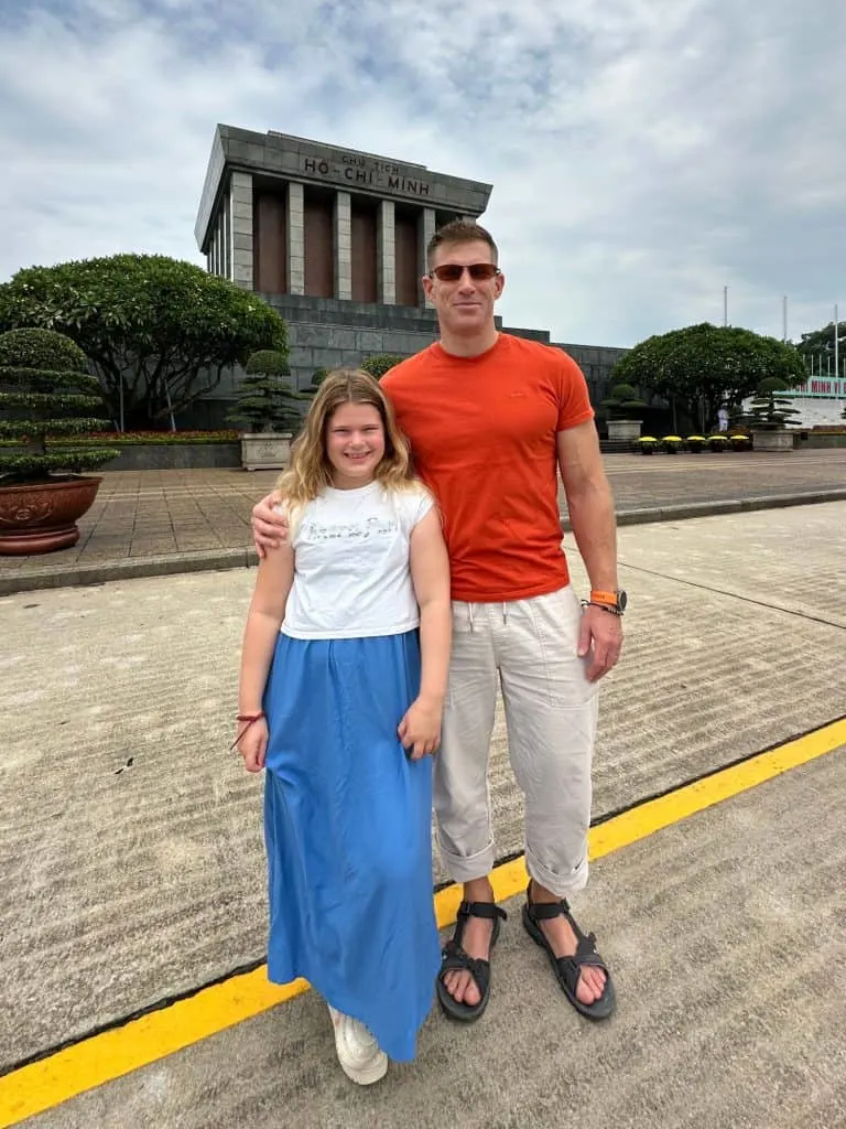 Mr Tin Box and our nine-year-old stood in front of the Ho Chi Minh Mausoleum