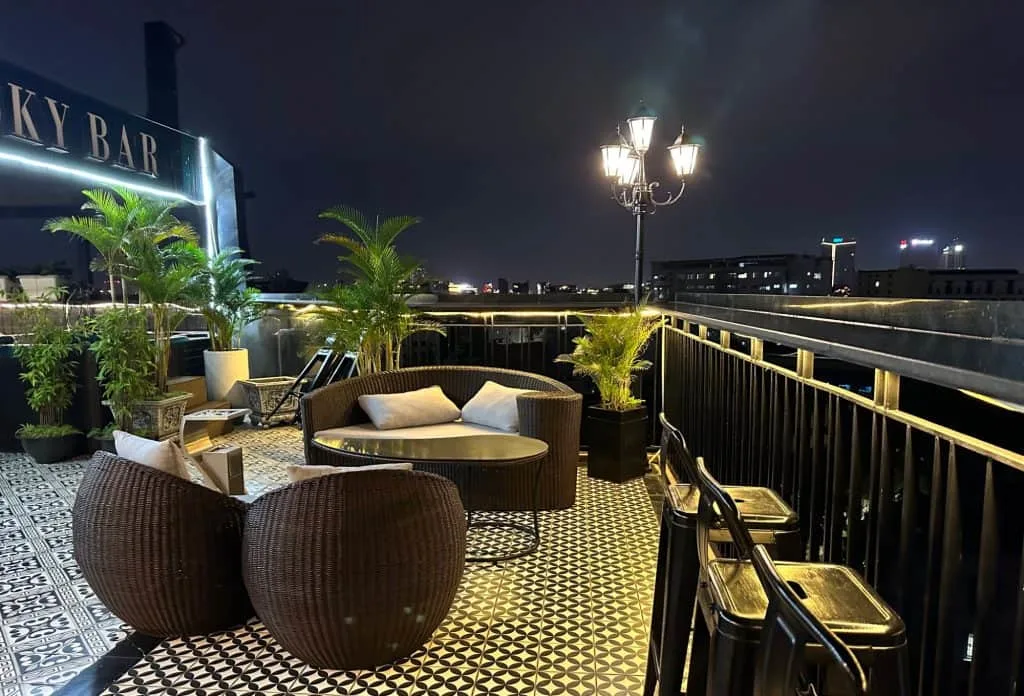 The Acoustic Hotel and Spa's sky bar at night
