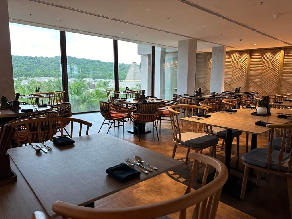 Tables and chairs in the Bay Kitchen restaurant