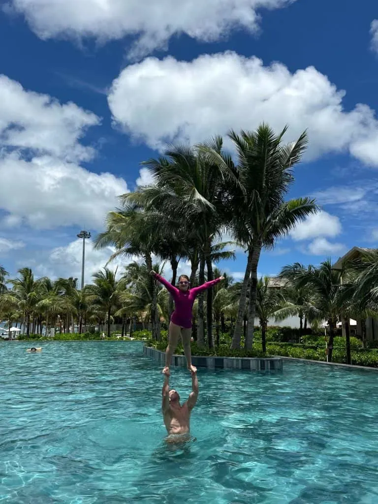 Mr Tin Box with our nine-year-old stood on his hands in the pool at New World Phu Quoc Resort